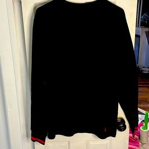 Black crew neck sweater
